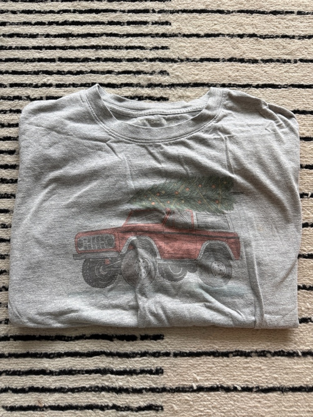 American Eagle Gray Crewneck Tee with Christmas Tree Bronco Truck graphic.